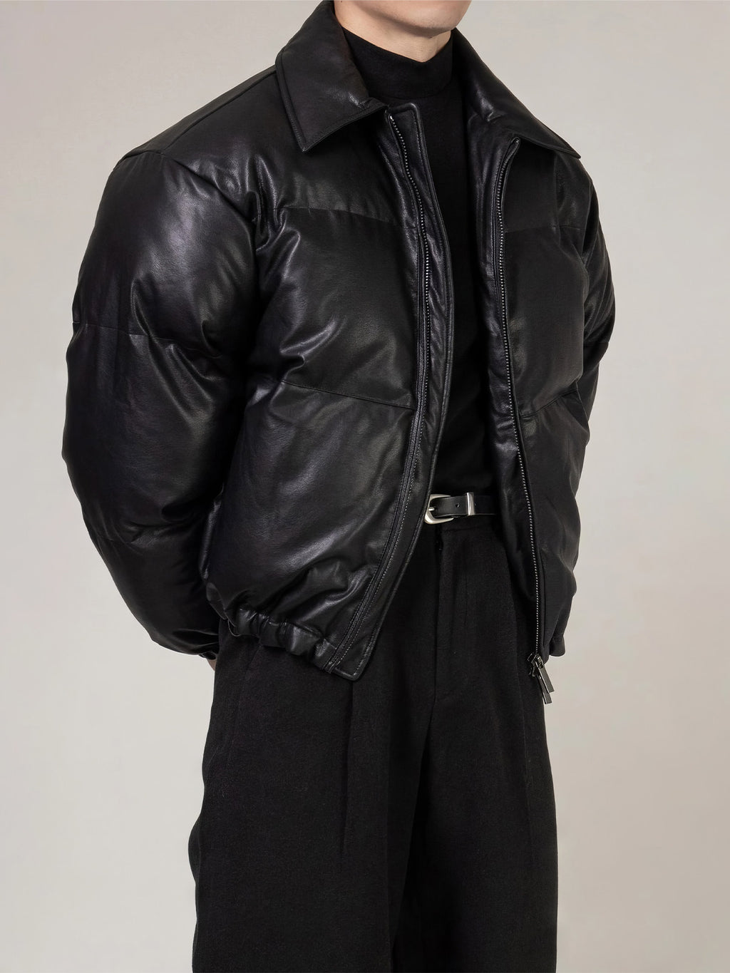PU Leather Puffer Jacket With A Stand-up Collar And Extra Padding